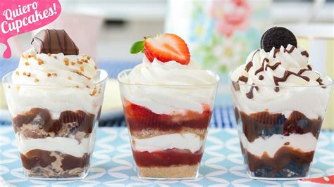 Variedad de postres individuales en copas y vasitos, mostrando diferentes capas y decoraciones.