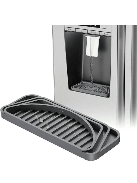 Detalle del soporte para conos y la bandeja de goteo extraíble de la máquina de helado Cuisinart