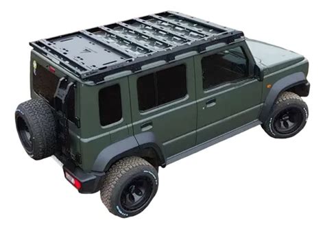 Suzuki Jimny 5 puertas con portaequipajes de techo cargado