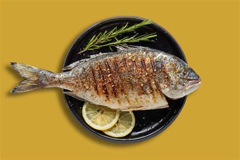 Infografía con los pasos clave para cocinar pescado a la plancha sin que se pegue.