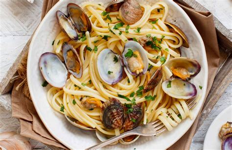 Foto de spaghetti alle vongole listos para servir