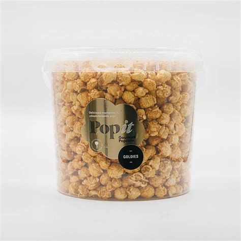 Lujosa lata de Berco's Popcorn con palomitas doradas