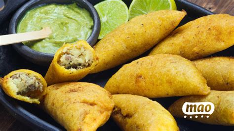 Ingredientes frescos para empanadas vallunas: carne, papa criolla, cebolla, tomate