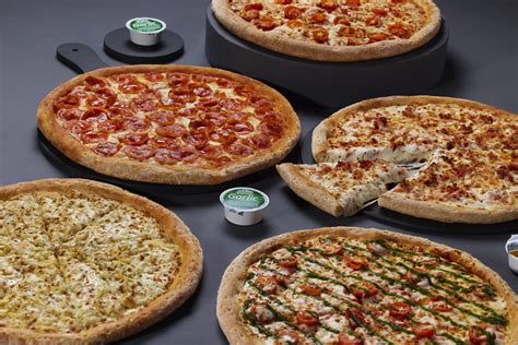 Foto de una variedad de pizzas de Papa Johns