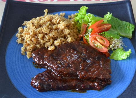 Plato de posta negra cartagenera con guarniciones