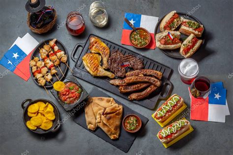 Mesa chilena con diversas ensaladas y asado