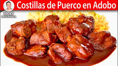 costillas de cerdo crudas con ingredientes para el adobo