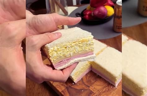 Sándwich de miga con capas de pimiento, huevo y otros ingredientes