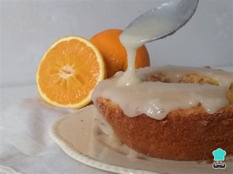 Tarta de naranja con glaseado y rodajas de naranja confitada