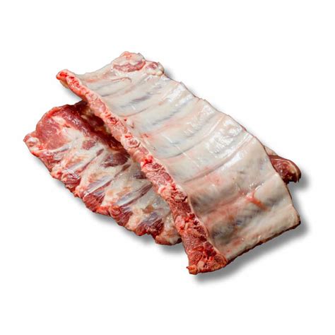 fotografía de costillas de jabalí dorándose lentamente sobre una parrilla