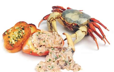 Plato de carapachos de jaiba rellenos y gratinados