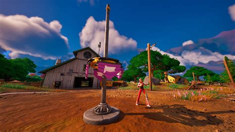 Captura de pantalla de Fortnite mostrando la línea de puntos que indica la ubicación de una cámara acorazada tras equipar la tarjeta de acceso.