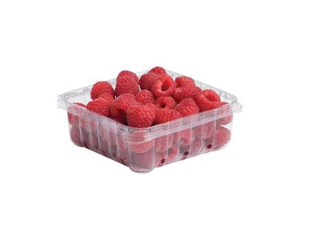 Bandeja de frambuesas listas para ser recolectadas