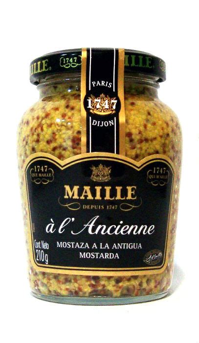 Botes de mostaza antigua y mostaza dijon