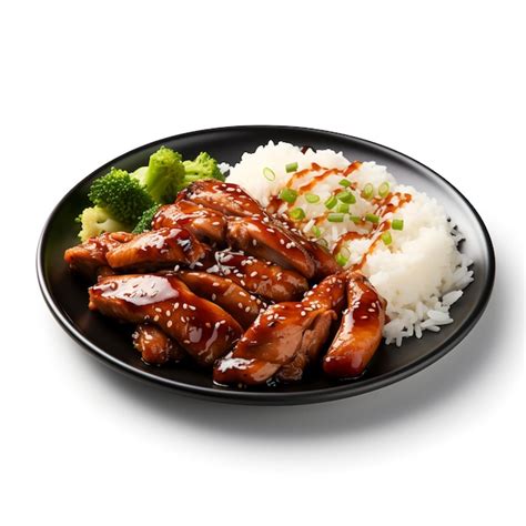 Plato servido de pollo teriyaki sobre una cama de arroz blanco con verduras salteadas al lado