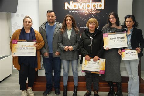 infografía con los tres ganadores del concurso de empanadas en Iquique