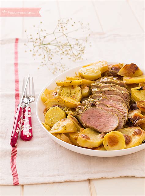 cerdo asado al horno con patatas y boniatos
