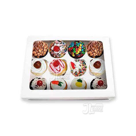 Diseño de caja para cupcakes transparente mostrando refuerzos internos y un cupcake en su interior