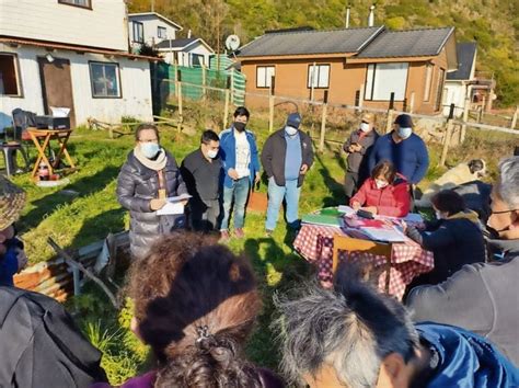 Fotografía de vecinos y vecinas participando en una actividad comunitaria en la Quebrada Cabritería.