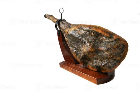 Foto de una pierna de jamón serrano Noel Consorcio en su jamonera con el cuchillo jamonero.