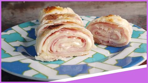 foto de arrollados de jamón y queso servidos con salsa agridulce en un entorno de restaurante chino