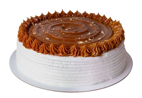 Imagen del montaje de capas de la torta de manjar y frambuesa.