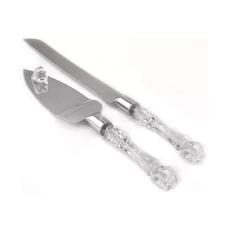 Foto de un set de cuchillo y pala para torta de matrimonio