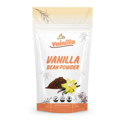 Vainilla en polvo en un recipiente pequeño con una cuchara medidora