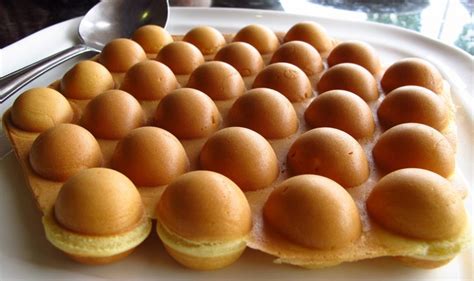 Waffle de Hong Kong con su forma circular y dividido en cuartos