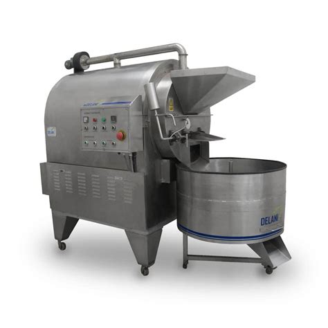 Máquina tostadora de granos de cacao en una fábrica