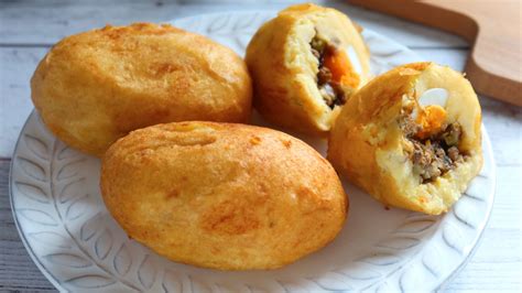 Esquema de la preparación del relleno (pino) para las papas rellenas, mostrando ingredientes y cocción.