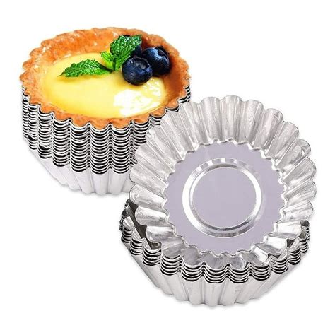 Foto de un molde de tartaleta de metal con base desmontable