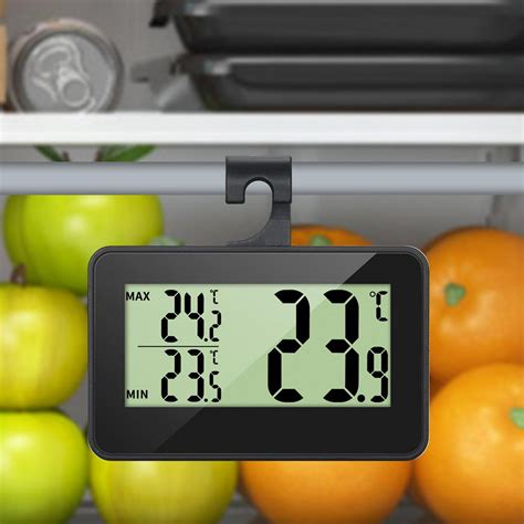 termómetro de refrigerador mostrando temperaturas óptimas para quesos