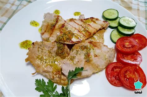 Lomo de cerdo adobado a la plancha con guarnición