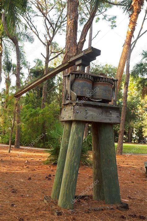 Máquina prensadora de caña de azúcar en funcionamiento