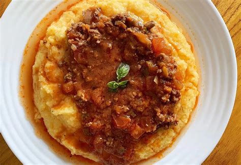 Foto: Polenta cremosa con salsa tuco y queso