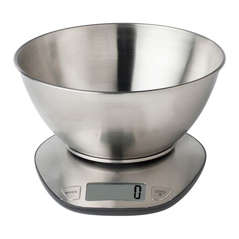 Balanza de cocina mostrando el peso de los damascos.