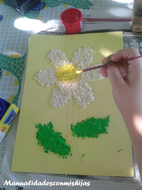 Ejemplo de dibujo infantil hecho con arroz de colores