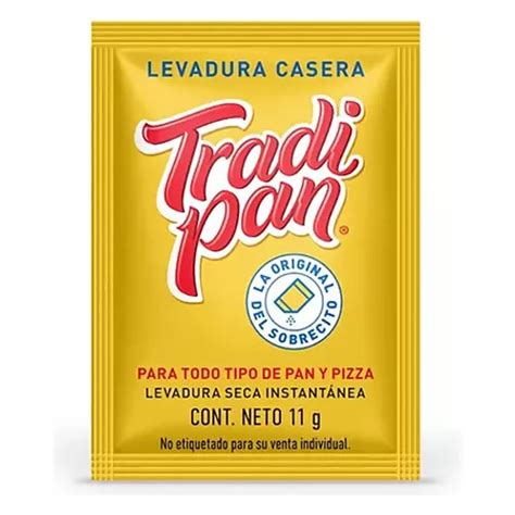 Foto de un sobre de levadura instantánea y otros ingredientes de pizza