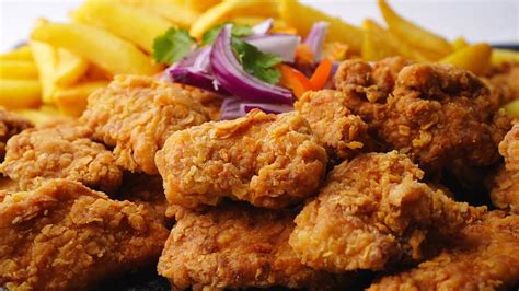 Thematic photo of chicharrón de pollo served with rice