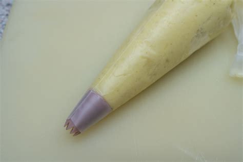 Rosetas de puré de patatas en manga pastelera