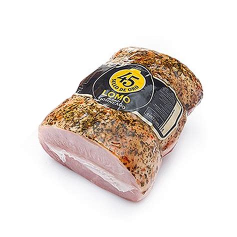 Foto de lomo liso horneado con hierbas frescas