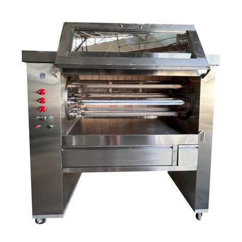 Esquema de un horno con asador rotatorio y pollo