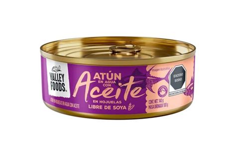 Comparativa visual de las latas de atún en agua y en aceite.