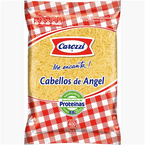 Fotografía: Variedad de formatos de pasta Carozzi dispuestos en una mesa de cocina.