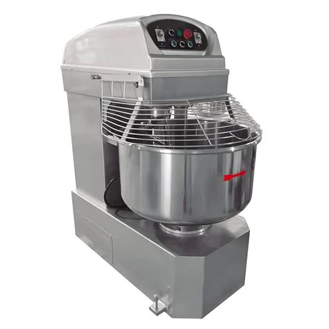 Amasadora planetaria en funcionamiento mezclando masa