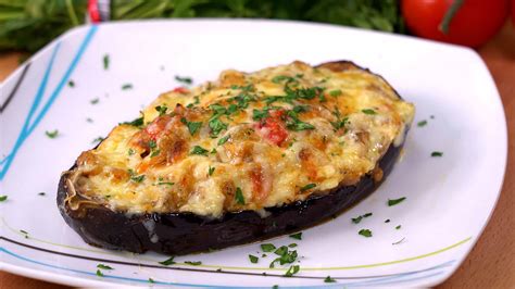 Berenjenas rellenas de jamón y queso gratinadas en el horno