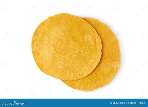 Foto de dos tortillas de maíz sobre una superficie de madera