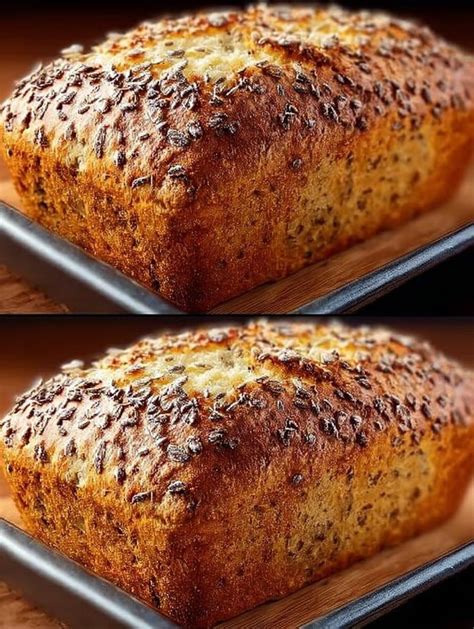 Pan de avena casero recién horneado sobre una rejilla de enfriamiento