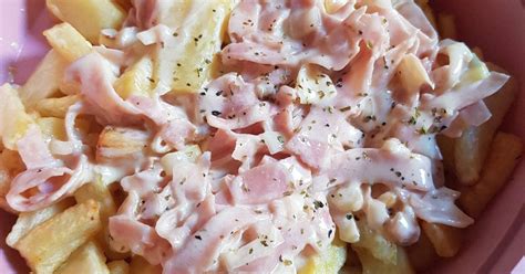 Papas rellenas fritas y horneadas con queso y jamón